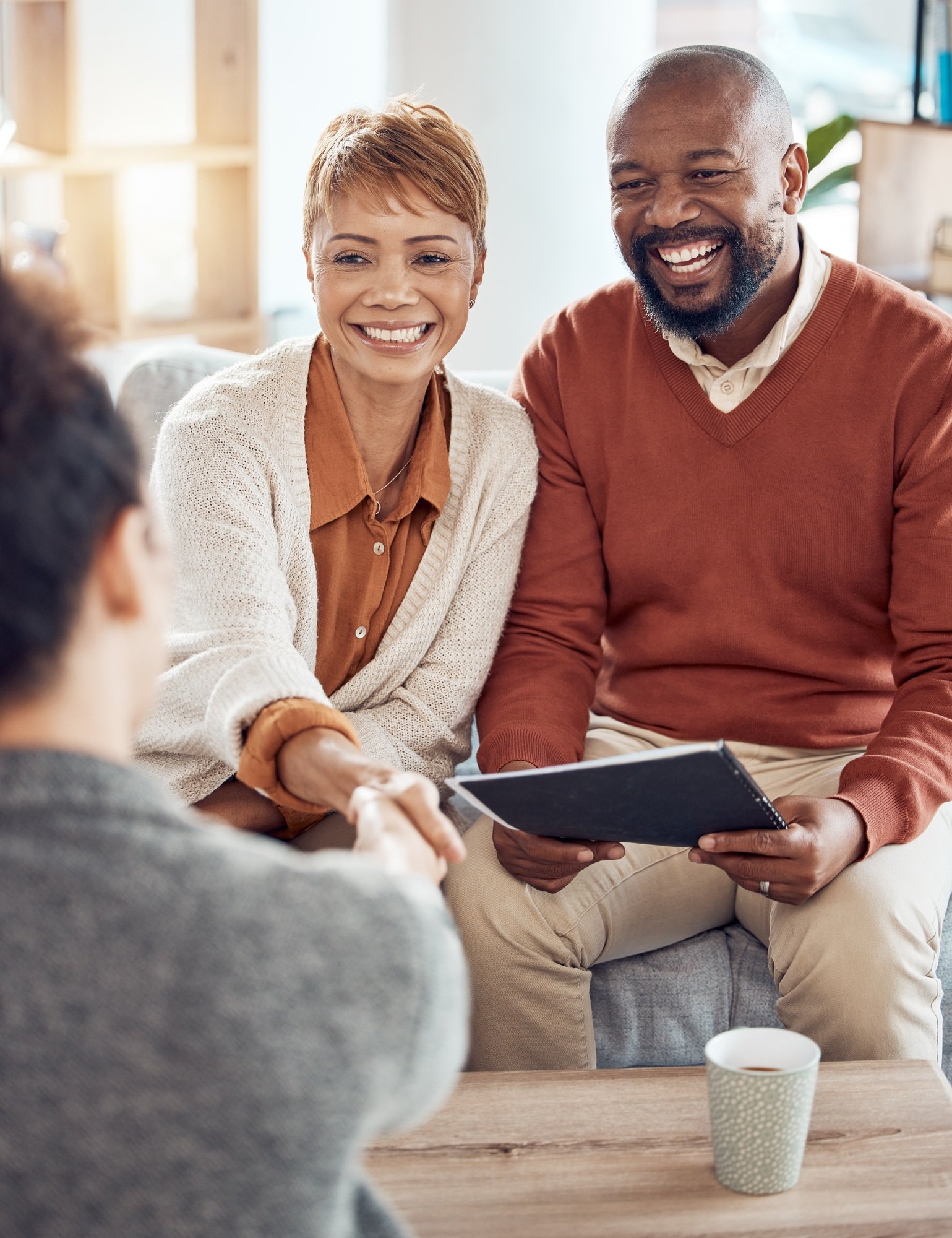 Consulting, planning and handshake with old couple and financial advisor for investment, insurance